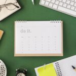 flat-lay-planner-calendar-green-background